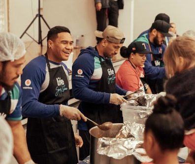 staff serving food in community kitchen