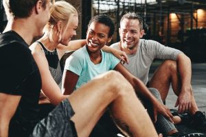 Group of friends enjoying a post-workout moment.